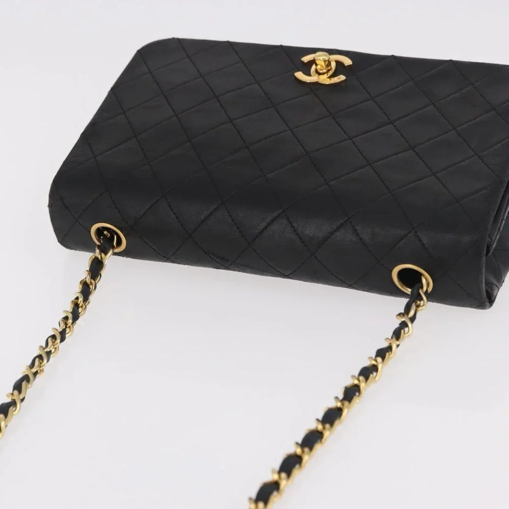 CHANEL Black Quilted Leather Shoulder Bag with Gold Hardware